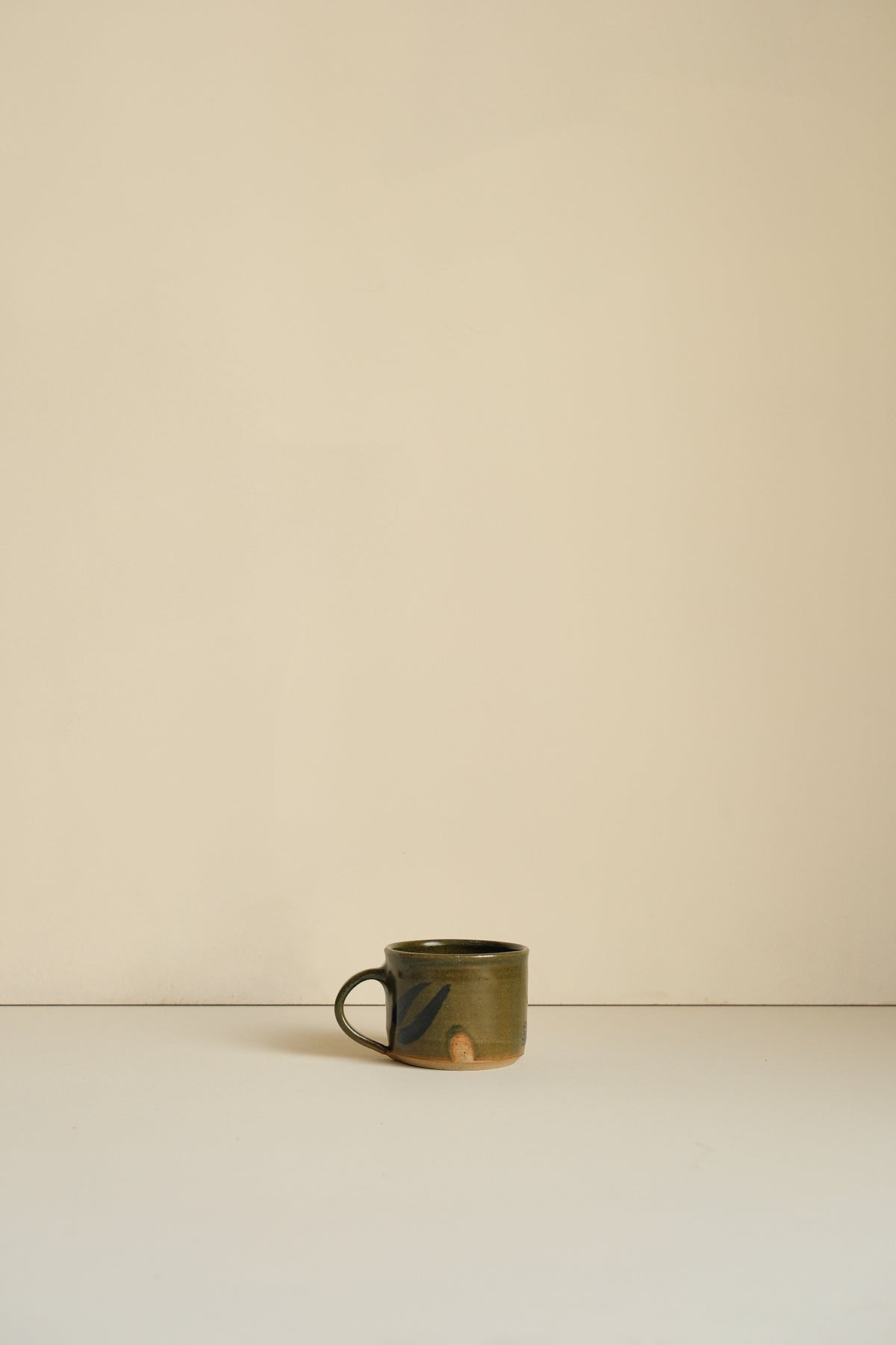 Abstract Moss Coffee Cup by Hannah Burgess