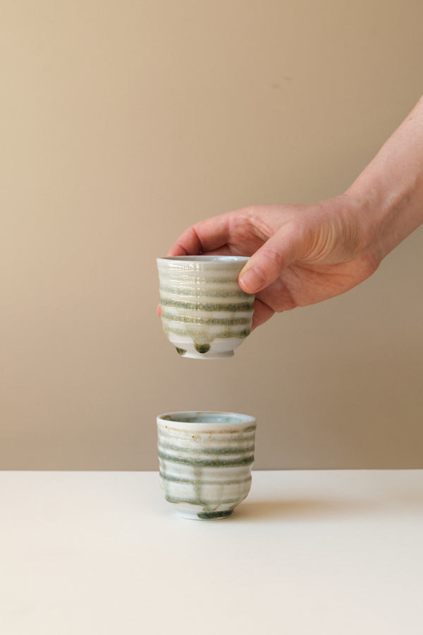 Porcelain Coffee Cup by Maya Hughes