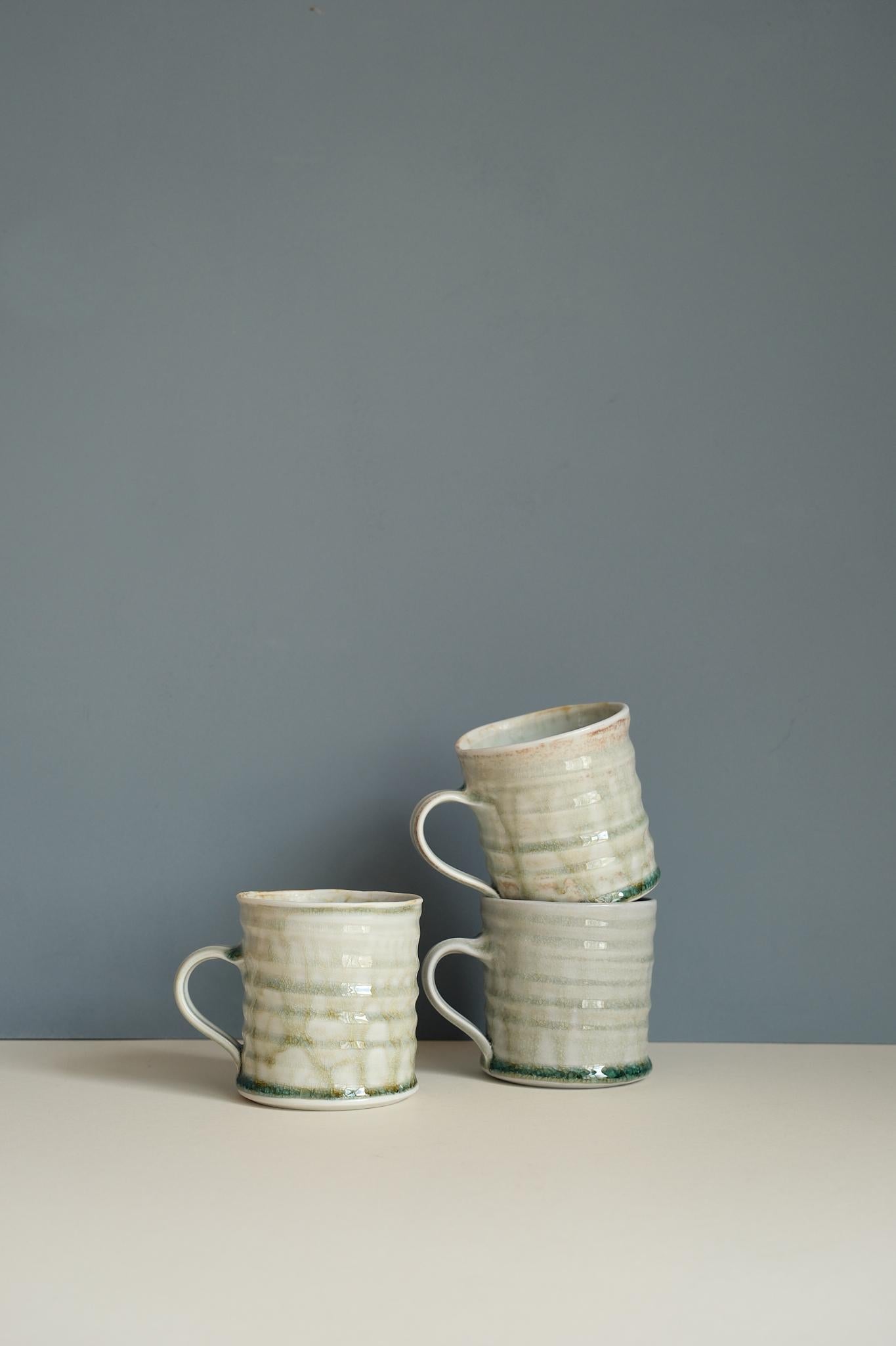Celadon Glaze Swirl Coffee Mug by Maya Hughes