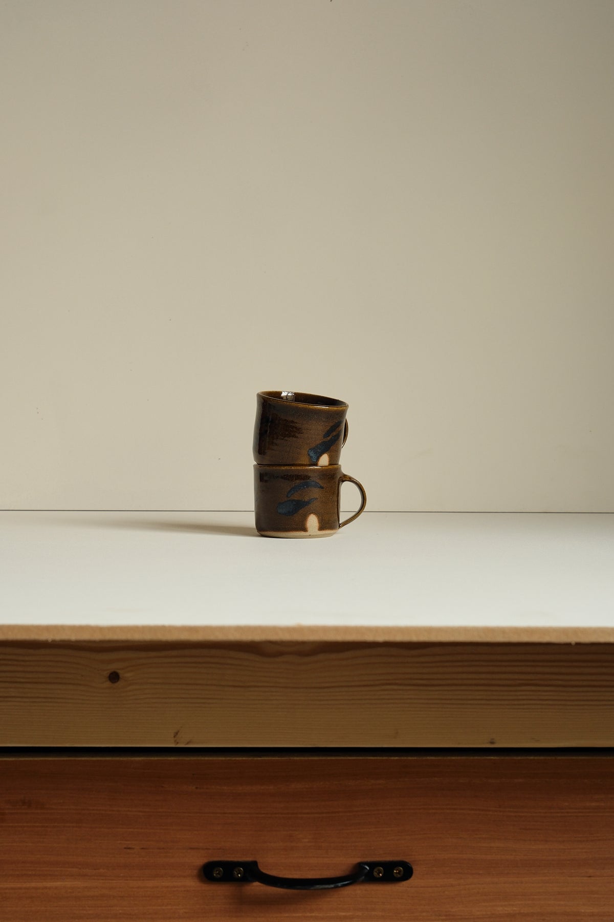 Abstract Umber Coffee Cup by Hannah Burgess